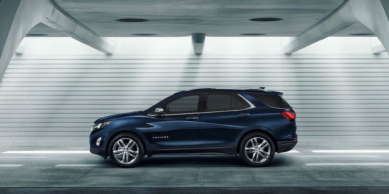2021 Chevrolet Equinox side view in parking garage